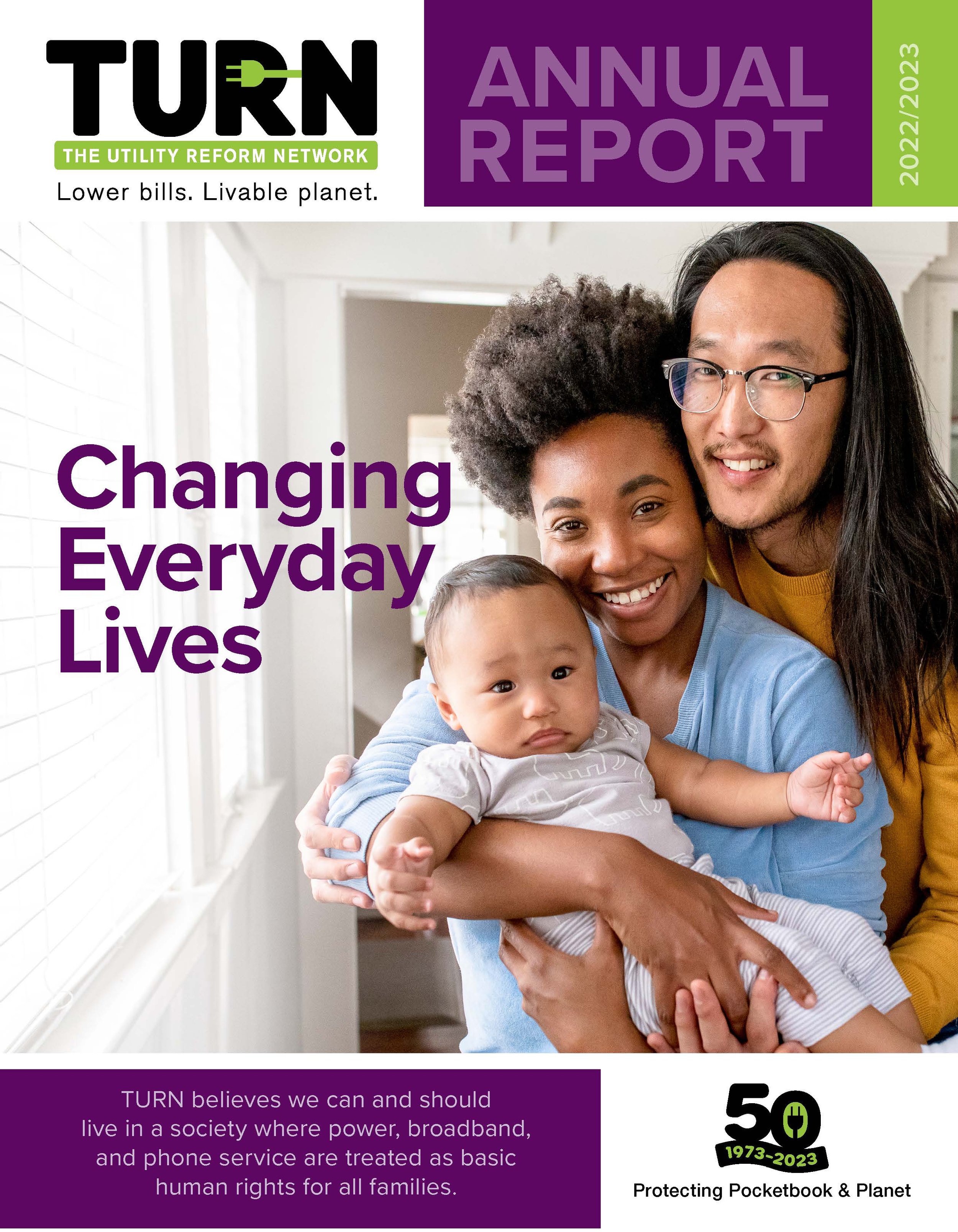 Cover of the TURN annual report for 2022-2023, showing a diverse family of three with a baby, smiling and embracing in a bright room.